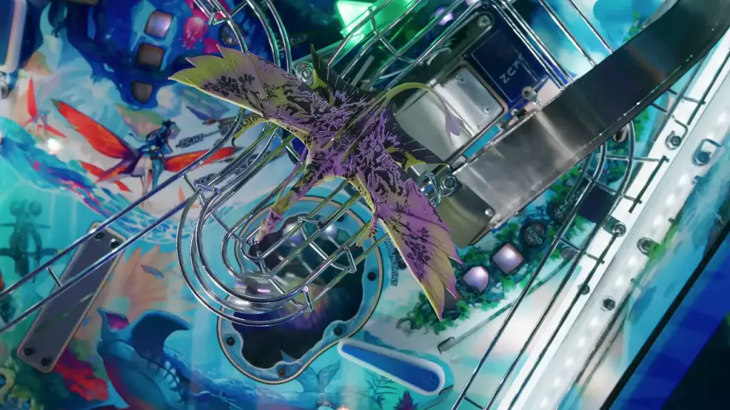 La bande-annonce du flipper Avatar : le plateau sous la lumière bleue et ultraviolette, l’écran du fronton.